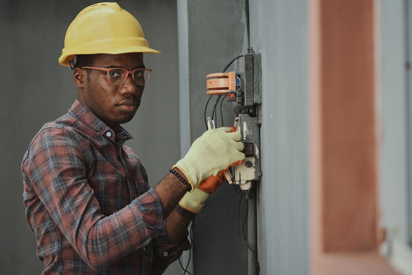 Champs Heating & Cooling technician on a service call